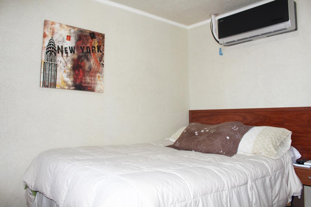 Residencial Victoria Said Hotel Linares Bagian luar foto